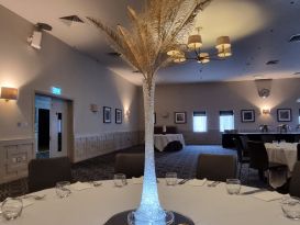 gold fern centrepiece